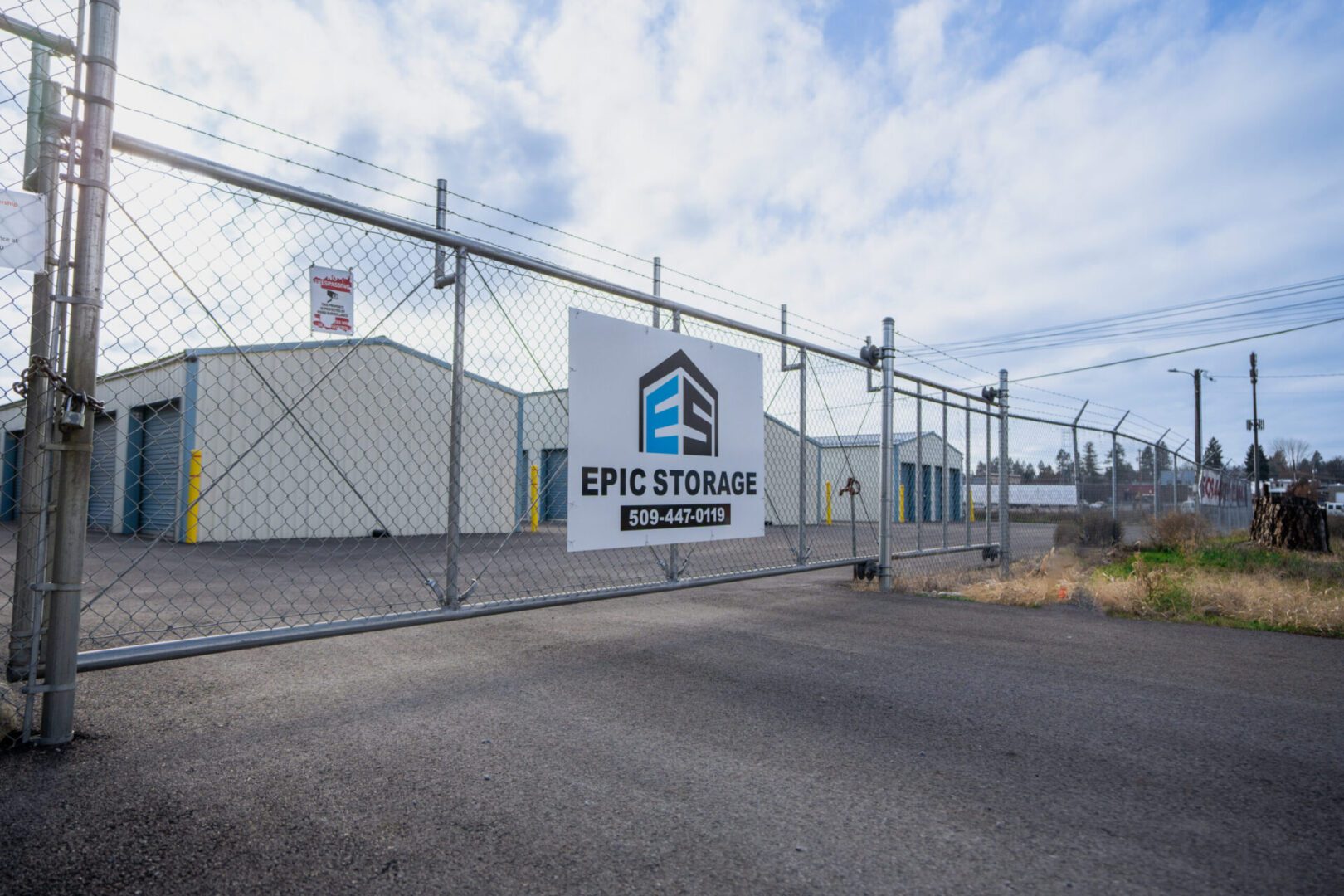 downtown-1 Storage facility with chain-link gate entrance.