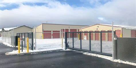 Seltice-2 Snowy storage facility with chain-link fence.