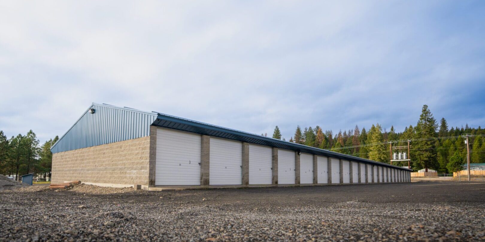 hwy-3 Storage units with blue metal roof.