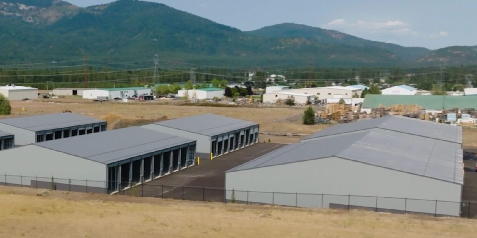 ra-2 Industrial buildings with mountains in background.
